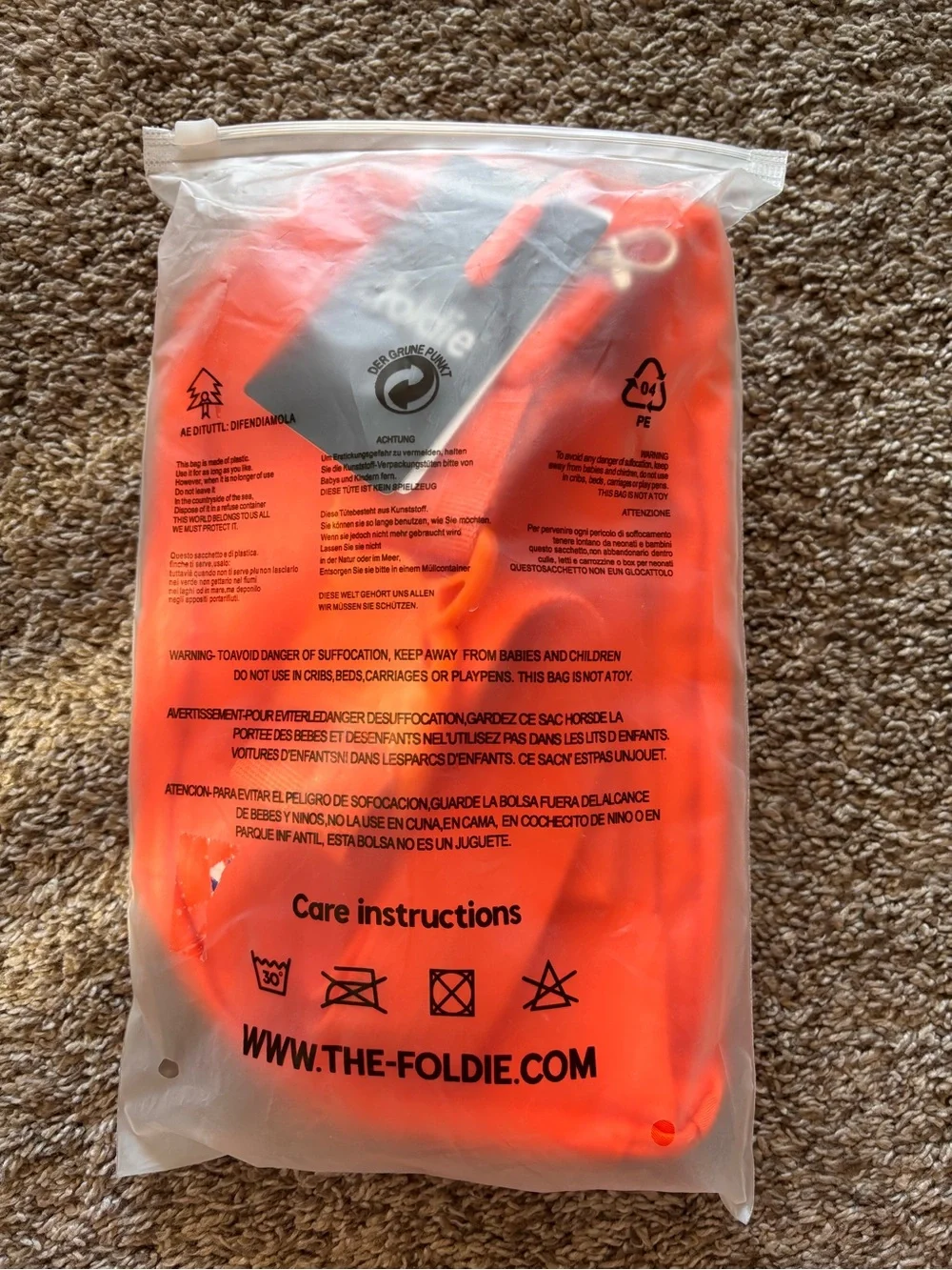 NWT The Foldie Orange Crossbody Bag/Fanny Pack/Travel Bag RFID safe wallet